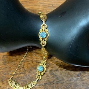 Antique Edwardian 10K and Blue Topaz Gold Filigree Medallion Bracelet